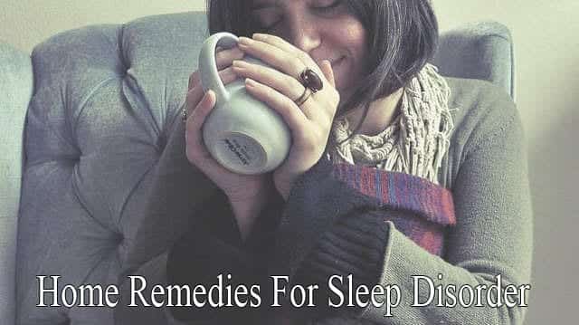 A woman sits on a chair, holding a mug and a blanket, with the text "Home Remedies For Sleep Disorders" displayed at the bottom.