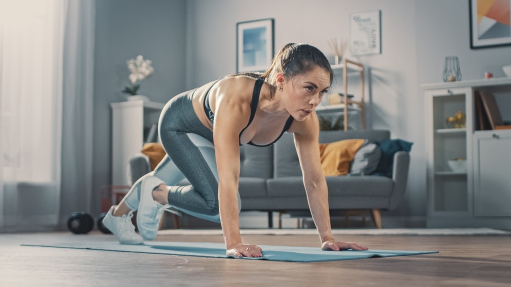 Women doing cardio workout at home