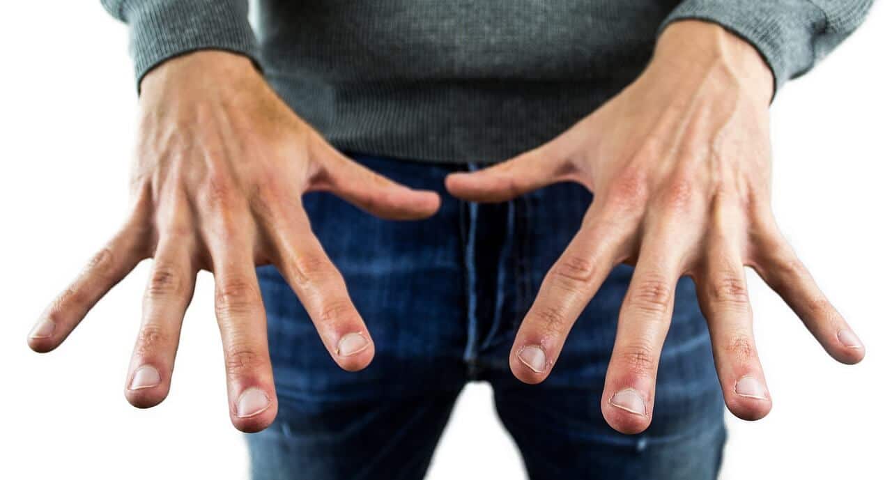 man showing his finger nails